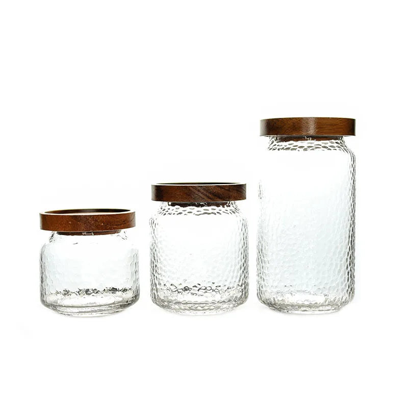 Réservoir de stockage en verre à couvercle en bois de nouvelle phase Réservoir d'étanchéité en verre à haute teneur en bore et en silicium Grain de thé aux fleurs transparentes